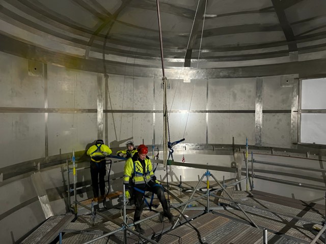 Installation work inside a dryer chamber